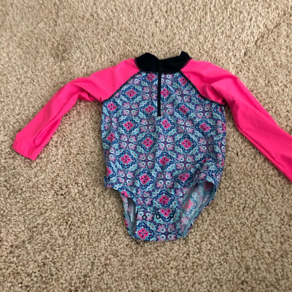 Long sleeve rash guard with snap bottom